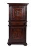 A Louis XIII Style Carved Walnut Cabinet