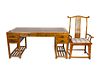 A Chinese Softwood Writing Desk and an Official's Hat Armchair
Height of desk 32 1/2 x length 70 1/2 x depth 34 1/2 inches; height of armchair 50 x wi