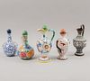 Lote de 5 jarras. Diferentes orígenes y diseños. S XX. Elaboradas en cerámica. Decorados con elementos vegetales.