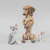 Lote de 3 piezas decorativas. Alemania. Siglo XX. Elaborados en porcelana, 2 Eschenbach. Consta de: 2 perros y gato.
