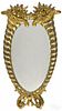 Carved giltwood mirror, ca. 1835, in the form o