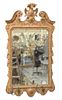 English Girandole Mirror, in Chippendale taste, having two brass candle arm holders, 18th century, height 42 inches, width 23 inches.