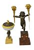 Two Piece Lot, to include a bronze putti form candlestick with two gilt bronze holders in the form of torches; along with an incense burner raised on 