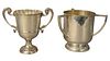 Two Silver Trophies, one having three handles, by Mappin Webb, hallmark on side; the other having two handles, hallmarked on side, heights 8 3/4 and 7