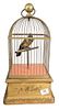 19th Century or Later Giltwood and Brass Automaton Bird Cage, having mechanical singing bird in brass cage with music box case, moving head, in workin