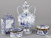 Four Delft blue and white wares, 18th c., to include a twin-handled bottle, 9 1/4'' h., a tea caddy