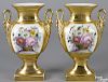 Pair of Paris porcelain garniture vases, 19th c., with hand-painted floral bouquets, 10 3/4'' h.
