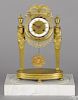 French gilt bronze Egyptian revival portico clock, 19th c., with a marble base, 14 1/2'' h.