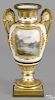 Sevres ormolu mounted porcelain urn, 19th c., with a painted portrait of Napoleon, signed