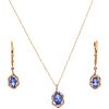 SET OF NECKLACE, PENDANT AND PAIR OF EARRINGS WITH TANZANITES AND DIAMONDS IN 14K PINK GOLD 3 Tanzanites and 86 diamonds