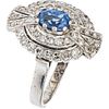 RING WITH SAPPHIRES AND DIAMONDS IN 14K WHITE GOLD 1 Oval cut sapphire ~0.75 ct and 44 8x8 cut diamonds~0.68 ct. Size: 7 ¼