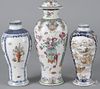 Three Chinese export porcelain garniture vases, late 18th c., 13'' h., 10'' h., and 9 1/4'' h.