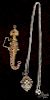 Victorian 18K yellow gold filigree sword and scabbard brooch containing fifteen round cut rubies