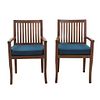 Par de sillones. SXX. Talla en madera. Con respaldos calados y asientos con cojines en tapicería color azul.