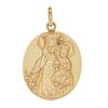 Medalla en oro amarillo de 18k. Imagen de Virgen con niño. Peso: 4.9 g.