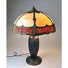 Caramel and Red Slag Glass Shade Table Lamp Having Curved Slag