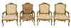 Suite of Four Louis XV Style Carved Open Armchairs