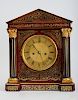 REGENCY GILT-METAL-MOUNTED AND BRASS-INLAID TORTOISESHELL AND ROSEWOOD MANTLE CLOCK