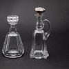 Baccarat Decanter and a Decanter with Silver Stopper