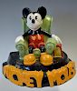 Mickey Mouse plaster cast figure featuring Mickey Mouse sitting in a arm chair with bold lettering t