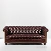 Tufted Leather "Chesterfield" Sofa.