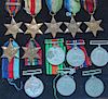 Selection of WWII Medals to include Burma Star, Africa Star, Atlantic Stars, 39/45 Star, Defence Med
