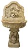 Three Piece Marble Fountain, having wall mounted putti fountain over scalloped oval bowls set on dolphin carved pedestal, probably 18th century or ear