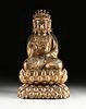 A MING DYNASTY GILT AND LACQUERED BRONZE BODHISATTVA FIGURE ON DOUBLE LOTUS THRONE, CHINESE, 17TH CENTURY, 