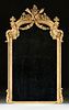 A LOUIS XVI REVIVAL PARCEL-GILT AND ORNATELY CARVED MANTLE MIRROR, FRENCH, THIRD QUARTER 19TH CENTURY,