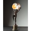 An Art Deco Patinated Bronze and Nautilus Shell Figural Table Lamp