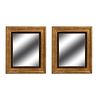 Par de espejos. SXX. Elaborados en madera dorada. Con lunas rectangulares y maria luisa color negro. 73 x 62 cm