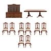 Comedor. SXX. En madera tallada y enchapada. Consta de: Mesa, 8 sillas y vitrina. 203 x 236 x 45 cm (mayor) Piezas: 10