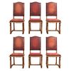 Lote de 6 sillas. Francia. Siglo XX. En talla de madera de roble. Con respaldos cerrados y asientos acojinados en tapicería.