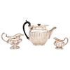 LOT OF TEAPOT AND PAIR OF CREAM JUGS RUSSIA, 19TH CENTURY RUSSIAN SILVER 5.9" (15 cm) maximum height Approximate weight: 999.4 g