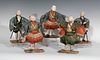 Set of five Samurai warriors; early 20th century.
Wood and silk clothing.