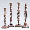 Group of Four Continental Lacquered Candlesticks