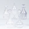 Group of Five Cut Glass Decanters and Four Stoppers