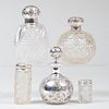 Group of Five Silver-Mounted Cut Glass Toilette Bottles 