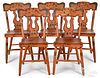 Five Pennsylvania painted plank seat chairs