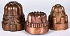 Three copper food molds, 19th c., the smallest sta