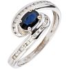 RING WITH SAPPHIRE AND DIAMONDS IN 18K WHITE GOLD 1 Oval cut sapphire ~0.40 ct and brilliant cut diamonds ~0.26 ct. Size: 6 ¾
