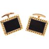 PAIR OF CUFFLINKS WITH ONYX IN 18K AND 10K YELLOW GOLD With onyx applications  Weight: 21.8 g
