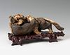 Beasts. China, 19th century. Ivory polychrome. Base in carved wood. Signed at the base.
