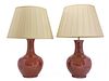 A pair of Chinese-style porcelain sang-de-boeuf table lamps,