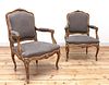 A similar pair of Louis XV-style gilt-framed armchairs,