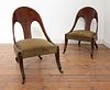 A pair of Regency mahogany klismos chairs,