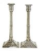 A pair of silver cluster column table candlesticks,