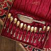 A cased set of twelve American silver ice cream spoons and cutter,