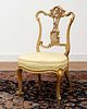 A French Louis XV-style giltwood salon chair,
