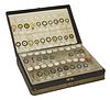 A collection of over 130 glass microscope slides,